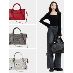 巴黎鉚釘機車包ins辣妹包法式高級感復古潮手提枕頭包單肩斜後後背包