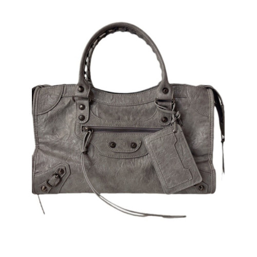 巴黎鉚釘機車包ins辣妹包法式高級感復古潮手提枕頭包單肩斜後後背包