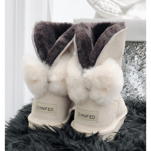 2025冬新款羊皮毛一體雪地靴女中短筒防滑保暖毛絨蝴蝶結繙毛短靴