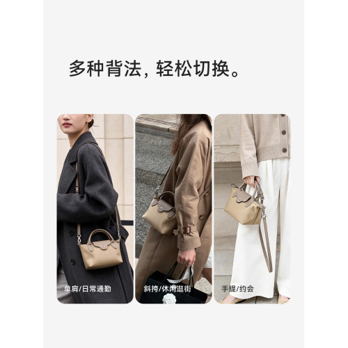 音樂家新款尼龍通勤斜後後背包女士百搭餃子包輕便實用手機雜物小包包