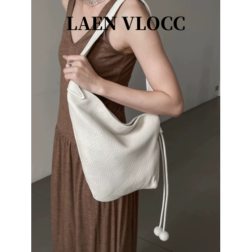 慵懶風大象紋泡泡羊皮牛角包2025夏季新款通勤hobo托特單肩斜後後背包