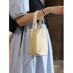 夏季手提小布袋馬卡龍清新帆布手拎水杯套鑰匙雨傘收納水桶小包包