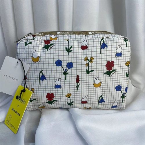 限定卡通米d*菲兔印花小方包化妝收納零錢手拿包7121