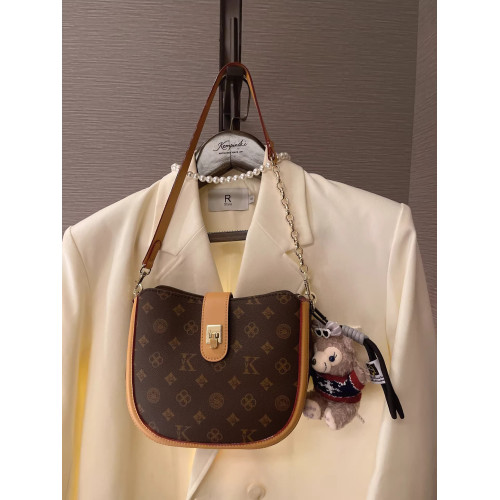 法國復古老花半圓馬鞍包女2026春新款高級感真皮老花腋下包斜後後背包