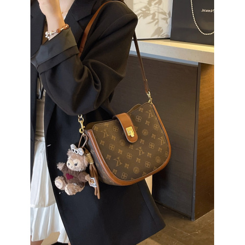 法國復古老花半圓馬鞍包女2026春新款高級感真皮老花腋下包斜後後背包