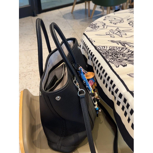 黑色真皮大容量托特包包女2026新款高級感通勤手提單肩斜背花園包