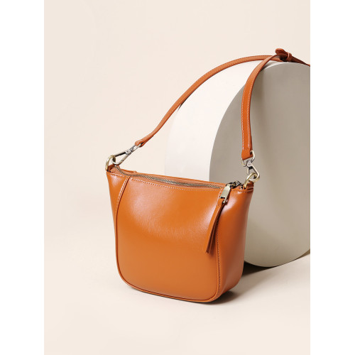 那馳植鞣頭層牛皮馬鞍包2026新款輕便餃子包復古單肩包軟皮斜後後背包