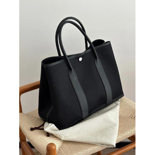 黑色真皮帆布大容量托特包包女2026新款高級感通勤手提單肩花園包