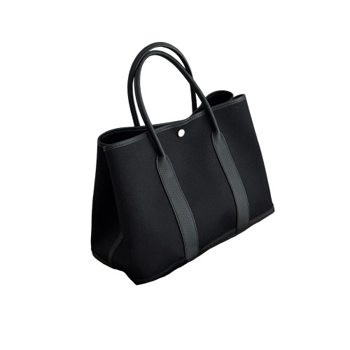 黑色真皮帆布大容量托特包包女2026新款高級感通勤手提單肩花園包