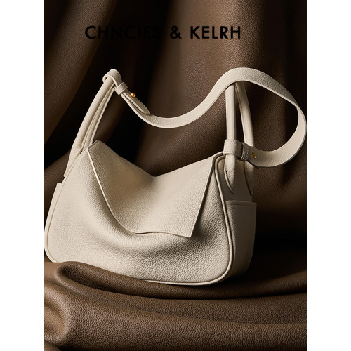 王楚然同款元寶包黑色真皮枕頭包小衆高級感單肩斜後後背包通勤腋下包