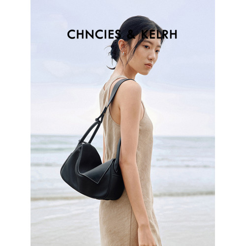 王楚然同款元寶包黑色真皮枕頭包小衆高級感單肩斜後後背包通勤腋下包