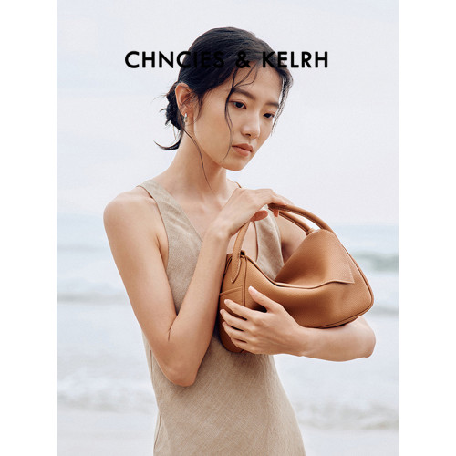 王楚然同款元寶包黑色真皮枕頭包小衆高級感單肩斜後後背包通勤腋下包