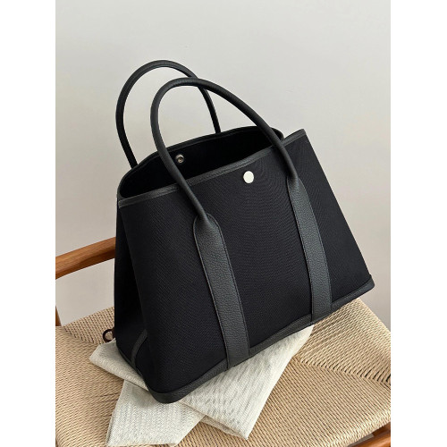 黑色真皮帆布大容量托特花園包包女2026新款高級感手提單肩斜後後背包 黑色真皮帆布大容量托特花園包包女2026新款高級感手提單肩斜後後背包