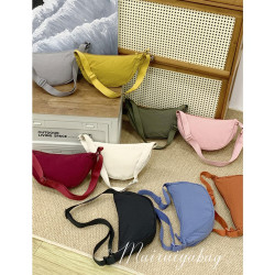 日單餃子包2025新款文藝休閒風尼龍帆布手機包斜後後背包腋下包單肩包