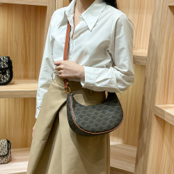 香港真皮腋下包包女2025新款秋冬月亮包半月包單肩斜背月牙包