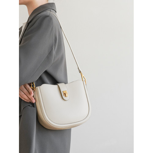 小衆輕奢包包女2025新款高級感復古半圓馬鞍包百搭單肩斜背腋下包