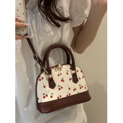 超火櫻桃貝殼小拎包包女式2025新款輕奢小衆設計高級感夏天斜後後背包