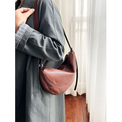 頭層牛皮餃子包女2026新款冬斜背馬鞍包大容量百搭小衆腋下月牙包