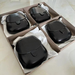 意大利小衆設計師男女通用真皮馬鞍包復古單肩斜後後背包迷你小貝殼包