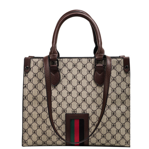 香港大容量真皮手提大包包女2024新款潮女士單肩斜後後背包公文托特包