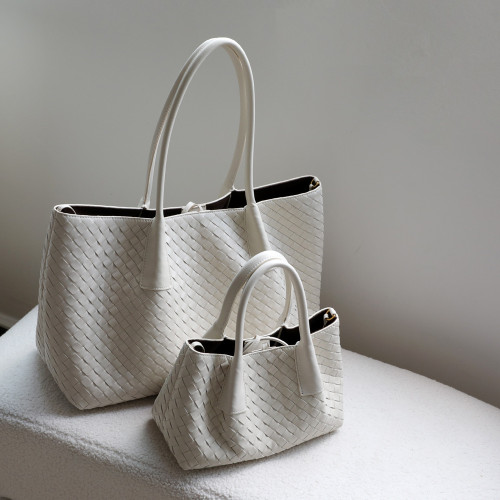 小衆輕奢牛皮編織托特包女大容量通勤簡約單肩包2025款質感手提包 小衆輕奢牛皮編織托特包女大容量通勤簡約單肩包2025款質感手提包