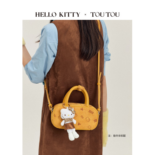 生日禮物TOUTOUhellokitty凱蒂貓棕色保齡球包斜後後背包手提斜後後背包女