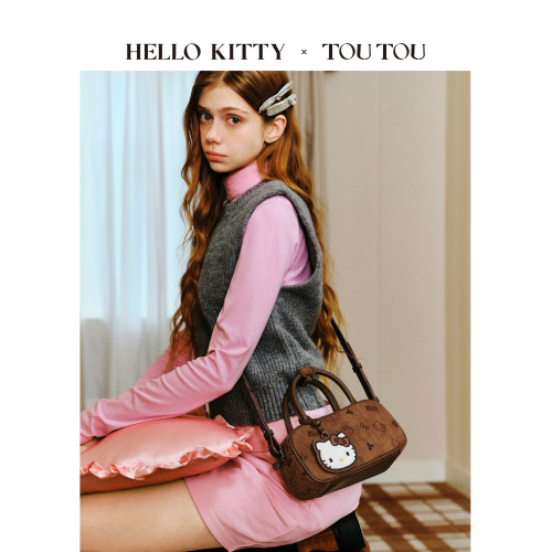 生日禮物TOUTOUhellokitty凱蒂貓棕色保齡球包斜後後背包手提斜後後背包女