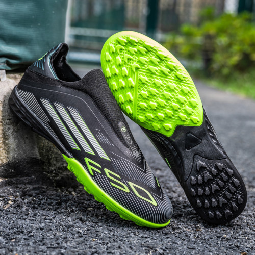 F50黑綠無鞋帶足球鞋男女成人學生FG長釘TF碎釘獵鷹人造草地訓練