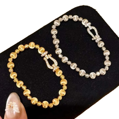 復古鑲鑽貓眼馬蹄釦手鏈女中古風小衆彈力繩手飾手串鏈條貓眼石