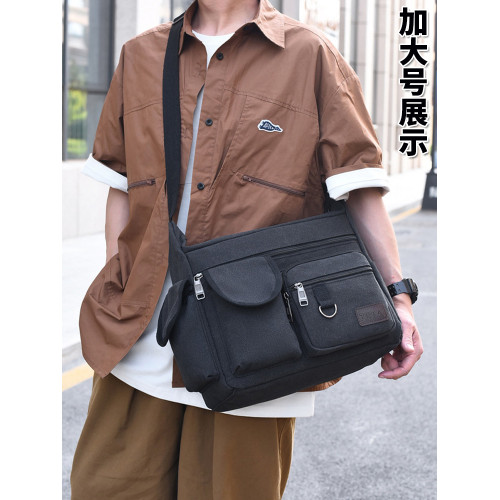 加大帆布包男包耐磨工地工具包大號勞保包單肩斜後後背包大容量旅行包