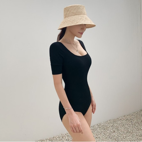 韓版保守泳衣女士連體三角遮肚修身顯瘦半袖防曬露背沙灘溫泉泳衣