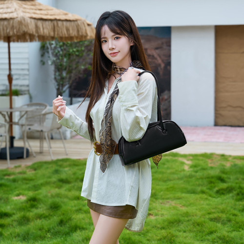 女士包包2025夏季新款時尚純色法棍包休閒單肩手提腋下包