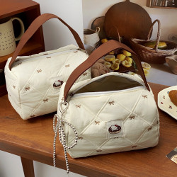 甜甜圈貓咪手提化妝包女2025新款百搭可攜式旅行收納包立體手提包包