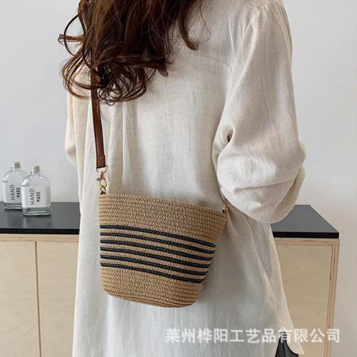 夏季流行草編小包包女2024新款海邊度假編織包休閒百搭斜背水桶包 夏季流行草編小包包女2024新款海邊度假編織包休閒百搭斜背水桶包