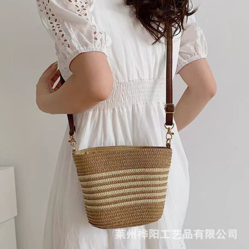 夏季流行草編小包包女2024新款海邊度假編織包休閒百搭斜背水桶包 夏季流行草編小包包女2024新款海邊度假編織包休閒百搭斜背水桶包