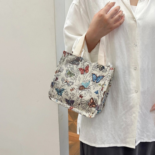 帆布包提花刺綉手提便當包媽咪包霤娃袋手提母嬰包學生通勤包女