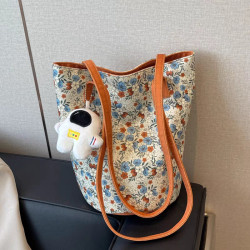 設計碎花單肩包女2024新款高顔值帆布包百搭復古大容量托特慵懶風