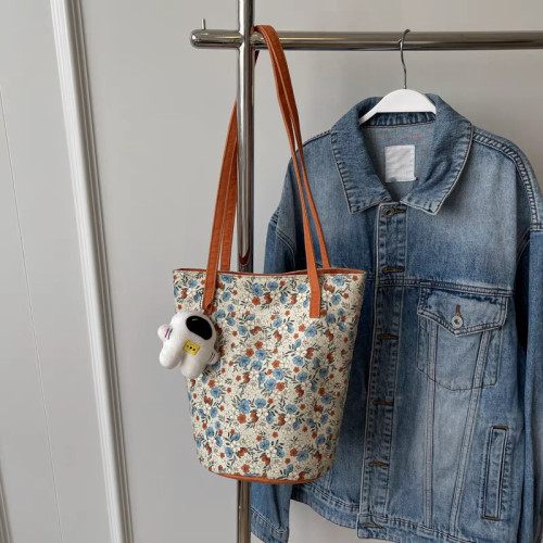 設計碎花單肩包女2024新款高顔值帆布包百搭復古大容量托特慵懶風