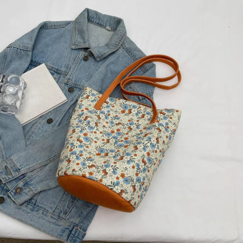 設計碎花單肩包女2024新款高顔值帆布包百搭復古大容量托特慵懶風