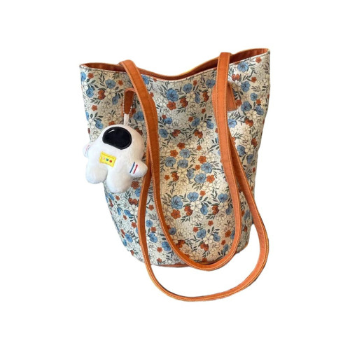 設計碎花單肩包女2024新款高顔值帆布包百搭復古大容量托特慵懶風