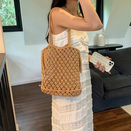 鏤空棉線編織包新款單肩流蘇草編包度假風沙灘包百搭女包