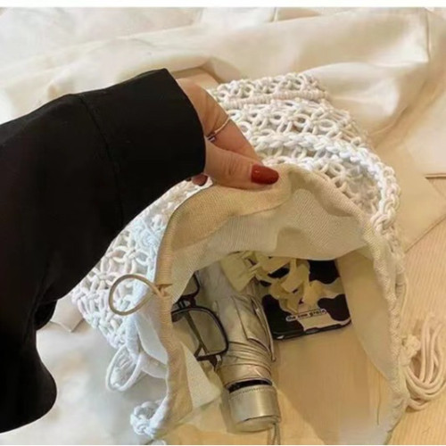 鏤空棉線編織包新款單肩流蘇草編包度假風沙灘包百搭女包