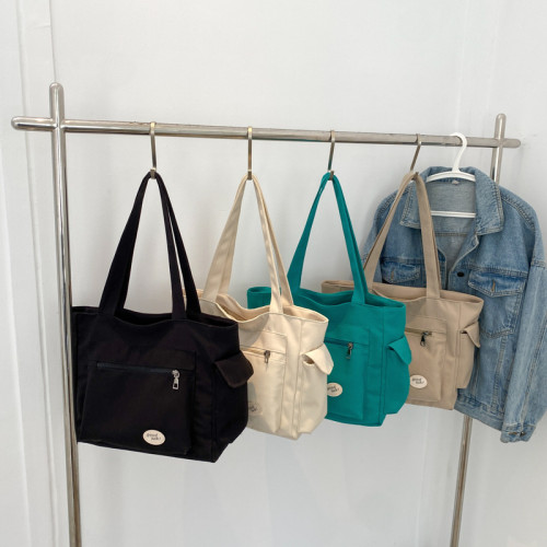 單肩包女大容量百搭帆布包學生簡約手提包休閒斜後背包補習包媽咪包