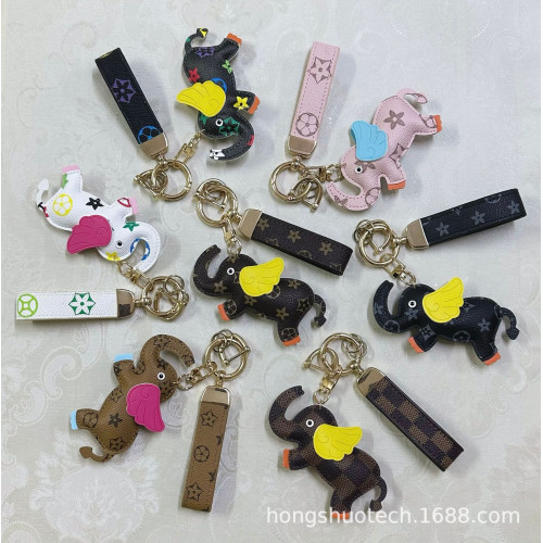 潮流大象包包掛件創意小飛象手機殼腕帶掛件皮質汽車鑰匙扣掛飾 潮流大象包包掛件創意小飛象手機殼腕帶掛件皮質汽車鑰匙扣掛飾