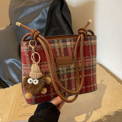 今年流行毛呢編織包包女2025新款潮時尚托特包女高級感小衆水桶包