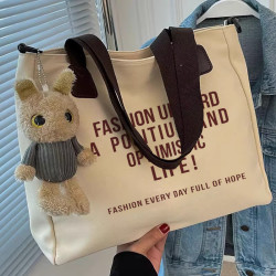 簡約休閒托特包大容量時尚通勤帆布包2024新款字母潮流單肩包