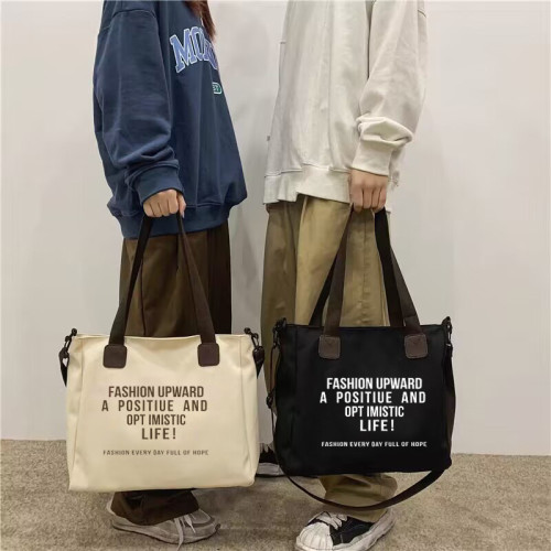 簡約休閒托特包大容量時尚通勤帆布包2024新款字母潮流單肩包 簡約休閒托特包大容量時尚通勤帆布包2024新款字母潮流單肩包