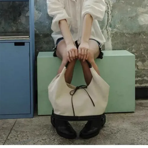 小衆復古單肩帆布包包女士2024新款韓版簡約上班小拎包腋下通勤包