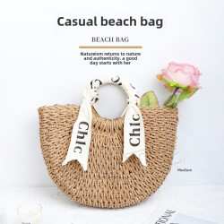 字母絲帶手提包半圓手工編織包百搭度假包沙灘草編包女包