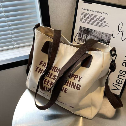 帆布包包女2024新款字母托特包 韓版時尚百搭斜背單肩包學生書包